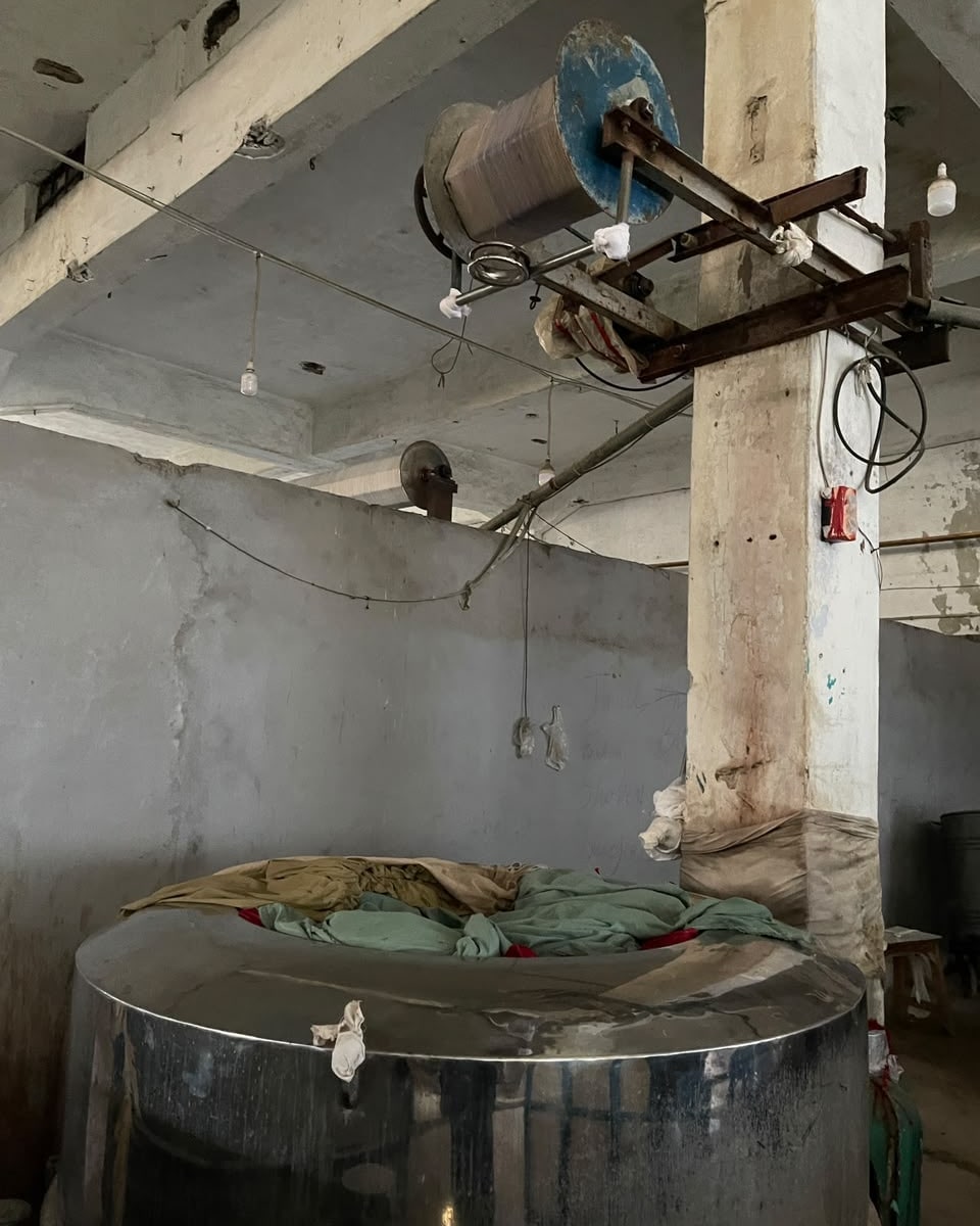 Fabric prepared at a dyeing vessel in the AL-KHAIR factory.